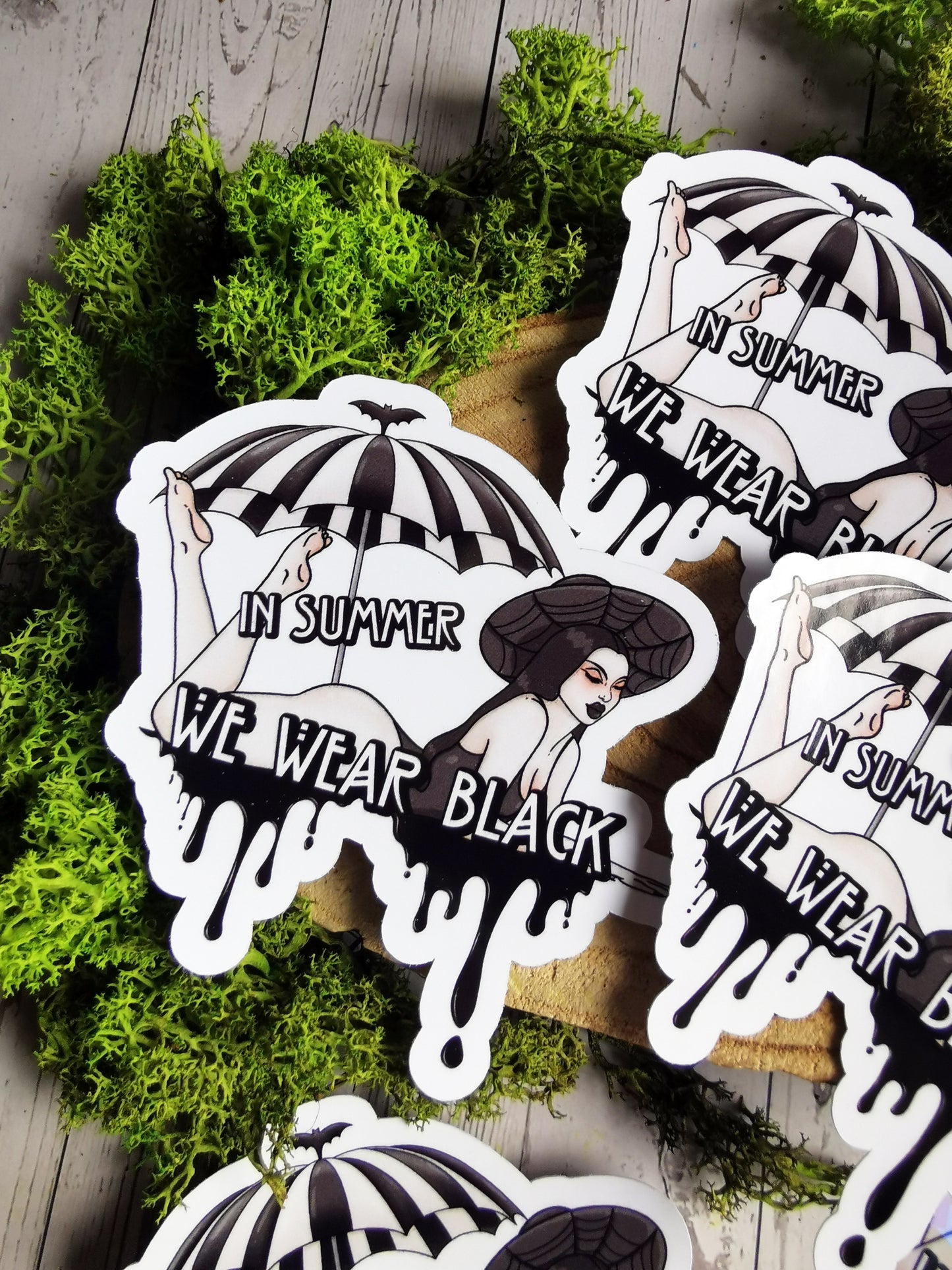 “In summer we wear Black” stickers