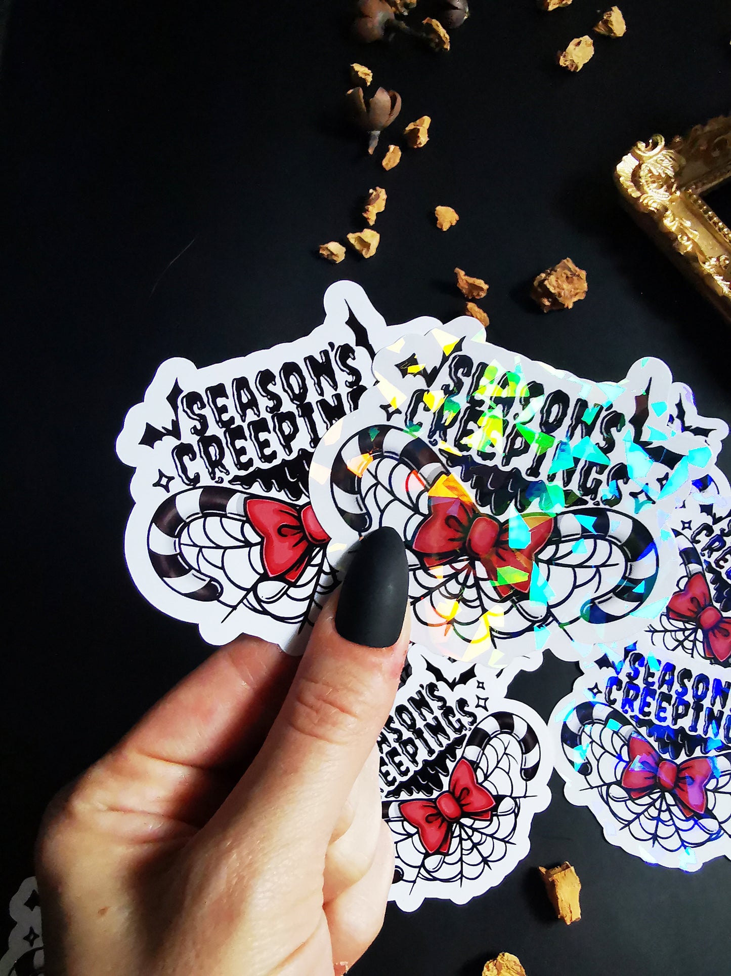 “Season’s Creepings” stickers