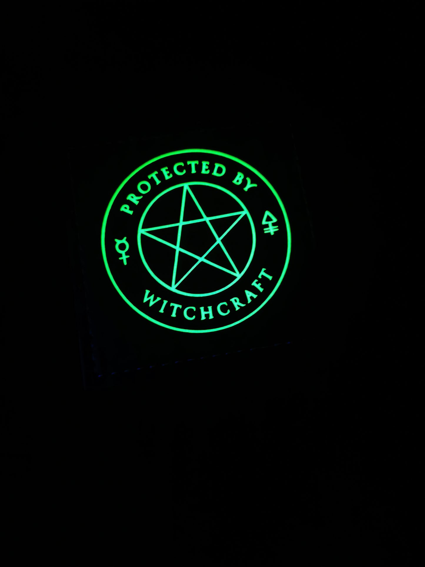 “Protected by Witchcraft” Coasters Glow in the Dark